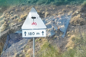October 27, 2013<br>Driving up Mount Etna, an active volcano, there were a number of curious warning signs.  Many were apocalyptic in nature.